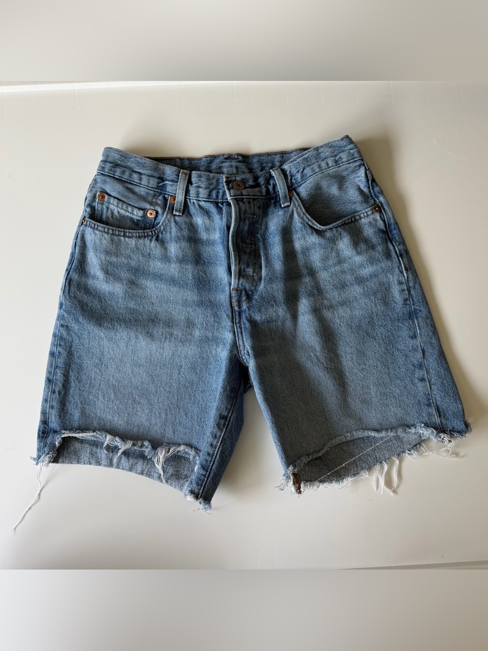 Levi's Women’s Med Wash Blue Denim Cutoff Jean Shorts Jorts W26 Distressed Hem